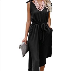 Black one piece romper with belt and tie shoulder